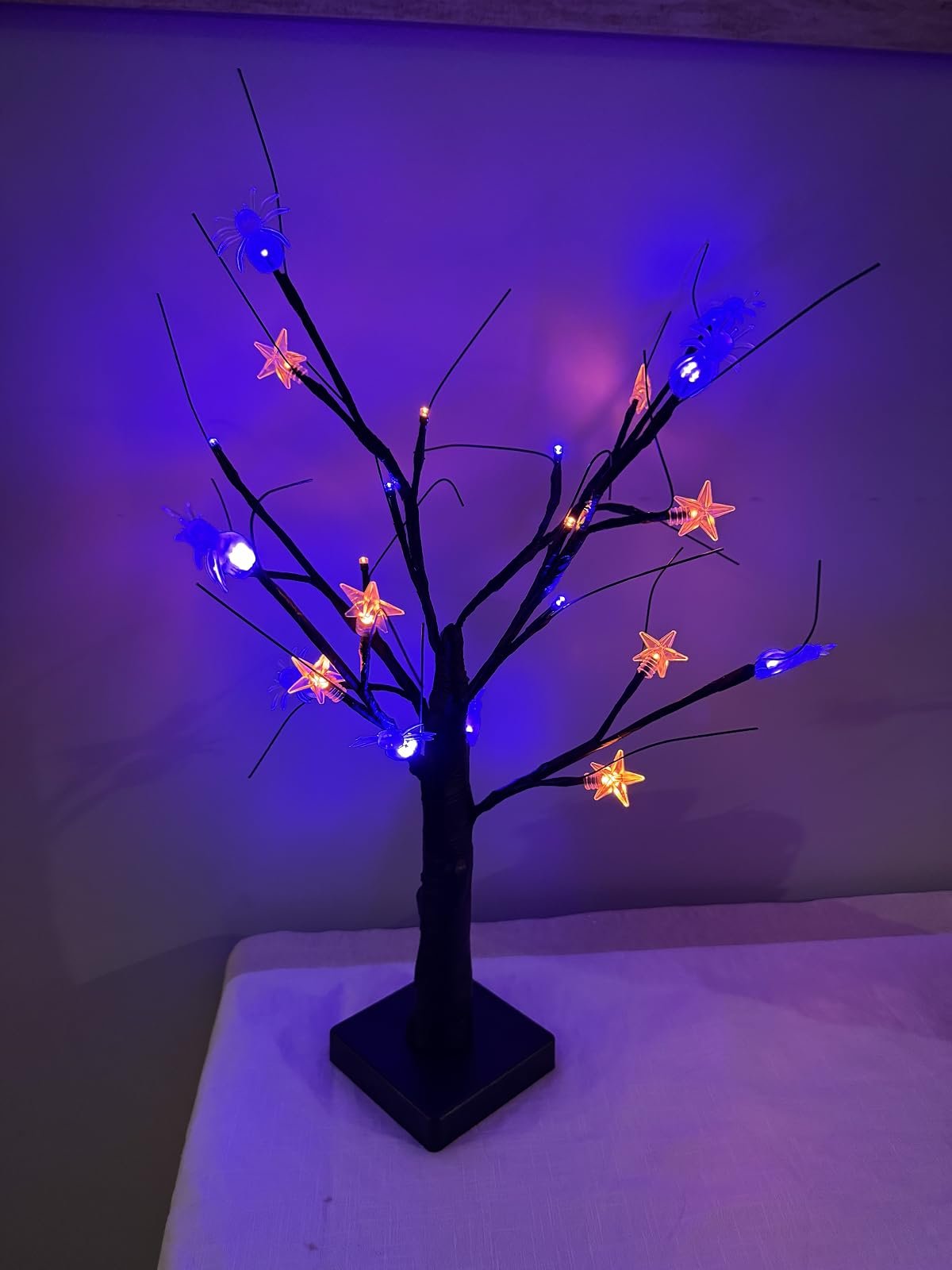 LED Halloween tree glowing purple and orange